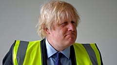 Britain's Prime Minister Boris Johnson visits the construction site of Ealing Fields High School in west London, Monday June 29, 2020
