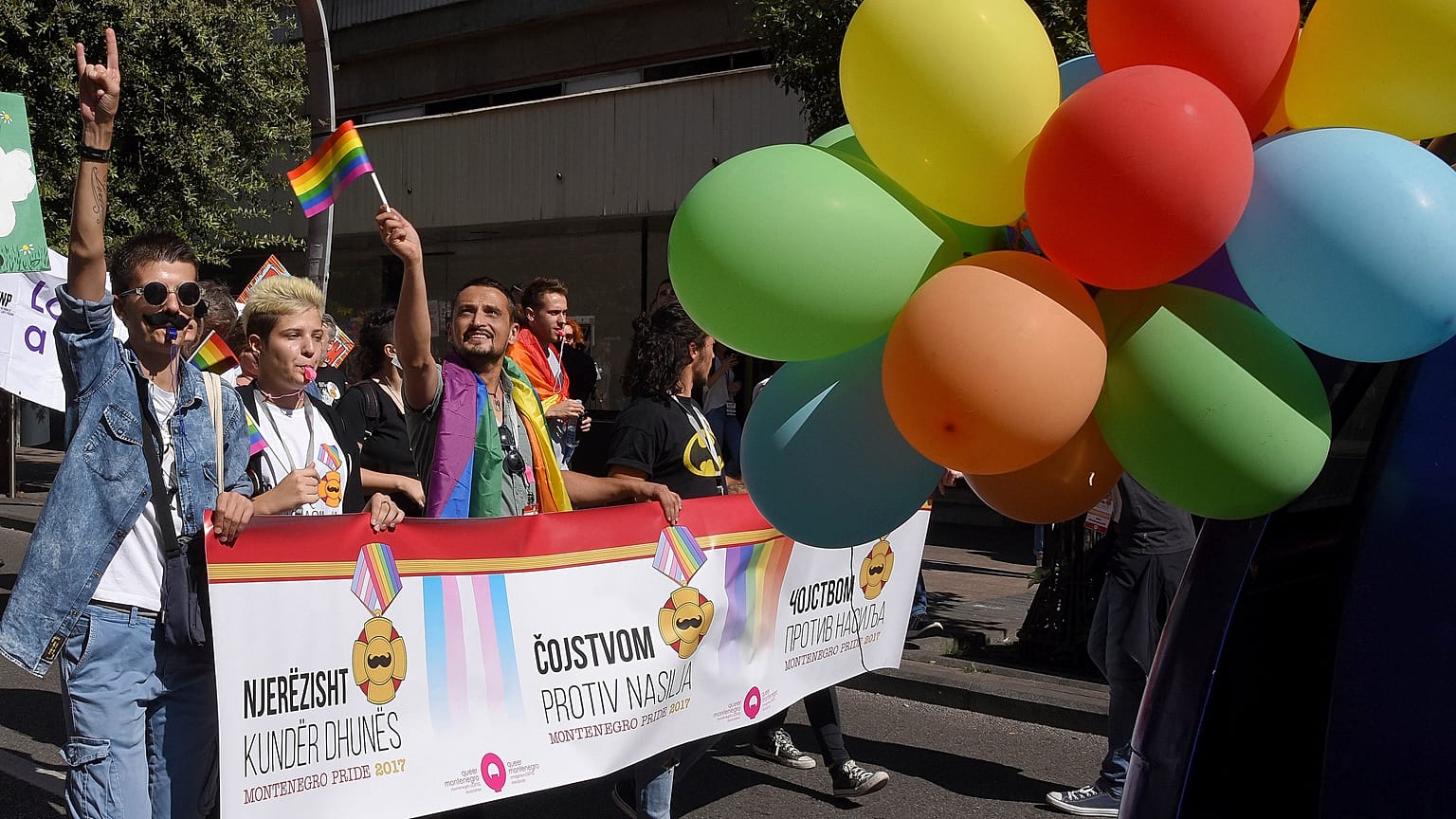 Participants dance during a gay pride march in Podgorica, September 2017.
