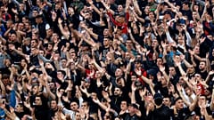 In this Wednesday, June 10, 2020. photo, Red Star fans support their team during a Serbian National Cup semi final soccer match between Partizan and Red Star in Belgrade.