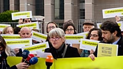 Protesters outside a court in Istanbul over the trial of Amnesty International activists