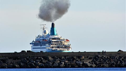 Which firms have been included alongside power plants in list of EU's top polluters?
