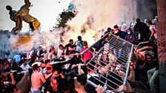 Protesters clash with police in front of Serbia's National Assembly building in Belgrade. July 8, 2020