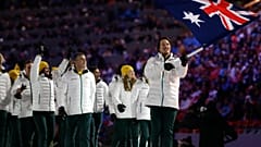 Alex Pullin of Australia carries the national flag as he leads the team during the opening ceremony of the 2014 Winter Olympics in Sochi, Russia