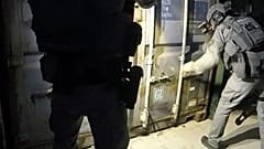 Dutch police raiding the containers on June 22, 2020.