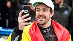 Fernando Alonso, of Spain, takes a selfie photo in Victory Lane after winning the 24 hour race at Daytona International Speedway, 2019