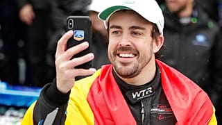 Fernando Alonso, of Spain, takes a selfie photo in Victory Lane after winning the 24 hour race at Daytona International Speedway, 2019