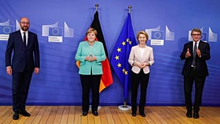Charles Michel, Angela Merkel, Ursula von der Leyen and David Sassoli pose for photographers prior to a meeting at EU headquarters in Brussels.