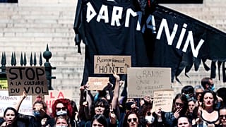 Feminist activists held two small protests Wednesday in Paris following Macron's appointment of an interior minister who has been accused of rape