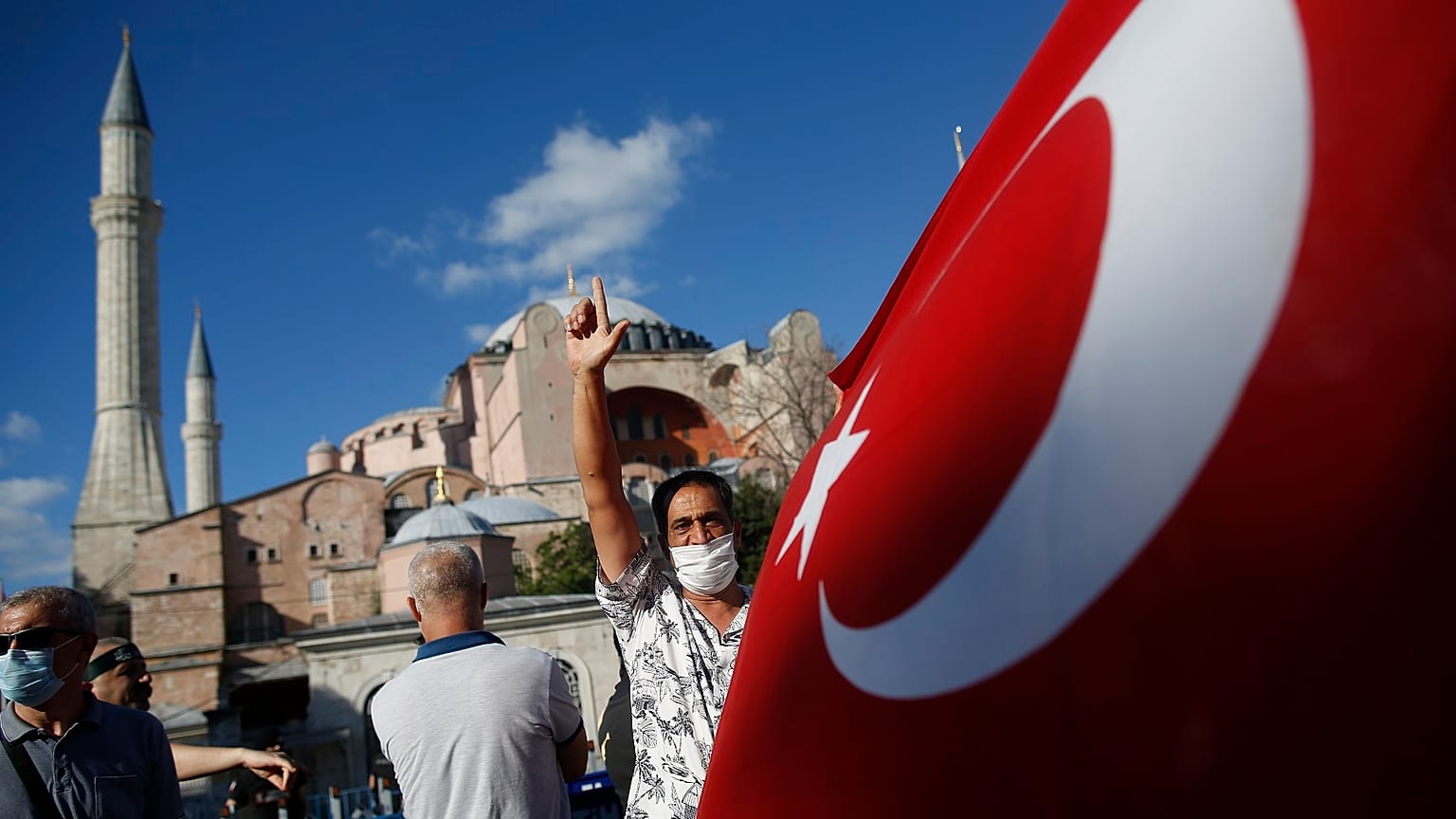 People chant slogans following Turkey's Council of State's decision to turn Haggia Sophia into a mosque.