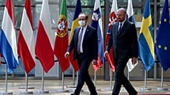 European Council President Charles Michel, right, walks with Kosovo's Prime Minister Avdullah Hoti before a meeting in Brussels in June