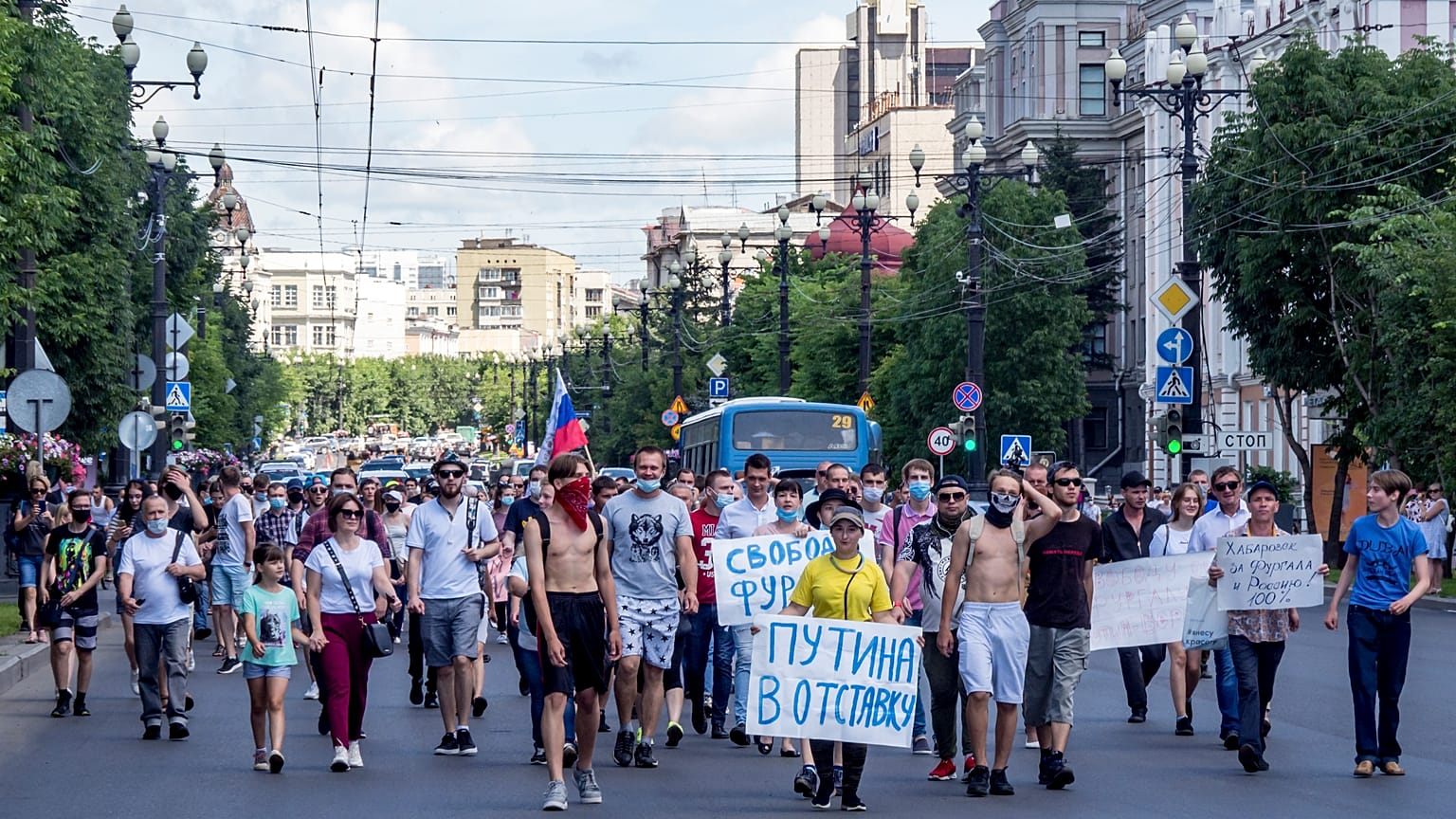 "Freedom for Sergei Furgal" and "Putin to Resign!" seen on posters during an unsanctioned protest on Sunday to support Sergei Furgal, Khabarovsk governor