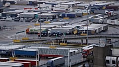 Lorries leave after disembarking a ferry as others wait to board on the morning after Brexit, Saturday Feb 1, 2020.