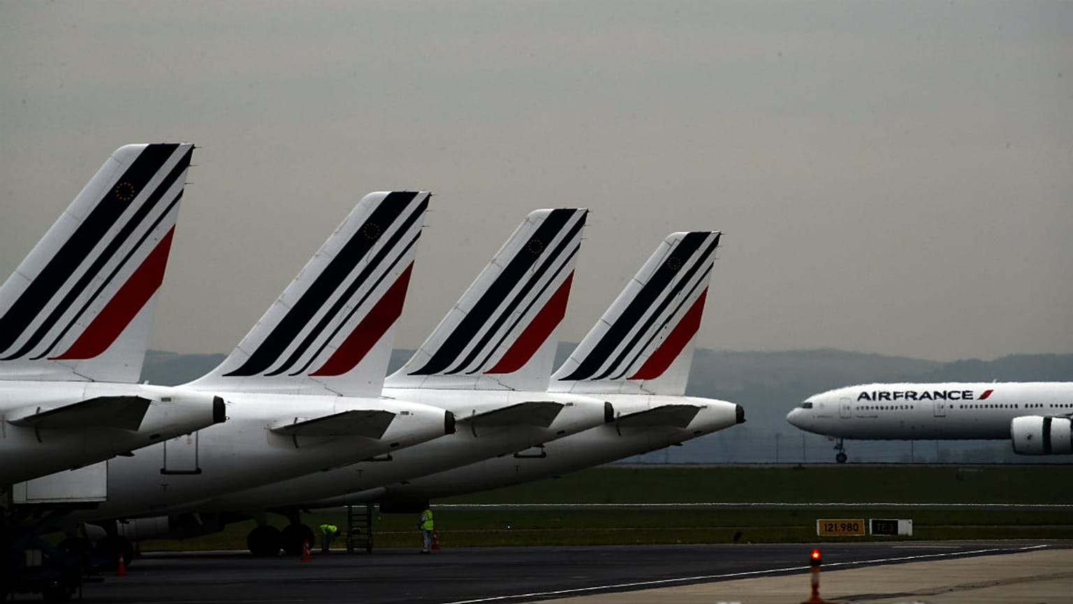 Air France planes are parked on the tarmac at Paris Charles de Gaulle airport, in Roissy, near Paris