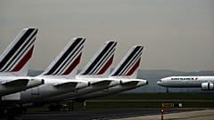 Air France planes are parked on the tarmac at Paris Charles de Gaulle airport, in Roissy, near Paris