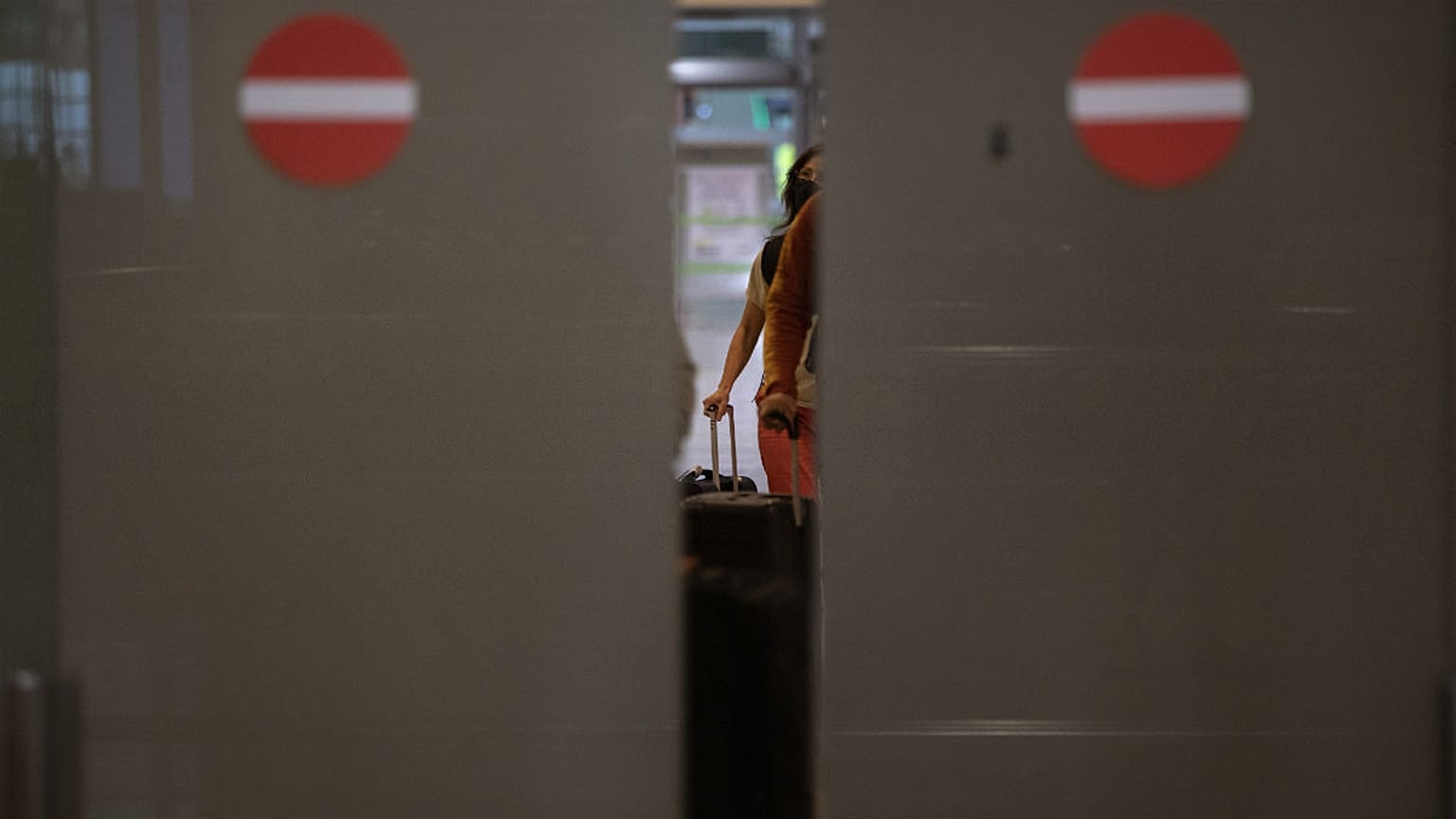 Passengers arrive at the Barcelona airport, Spain