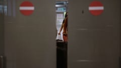 Passengers arrive at the Barcelona airport, Spain