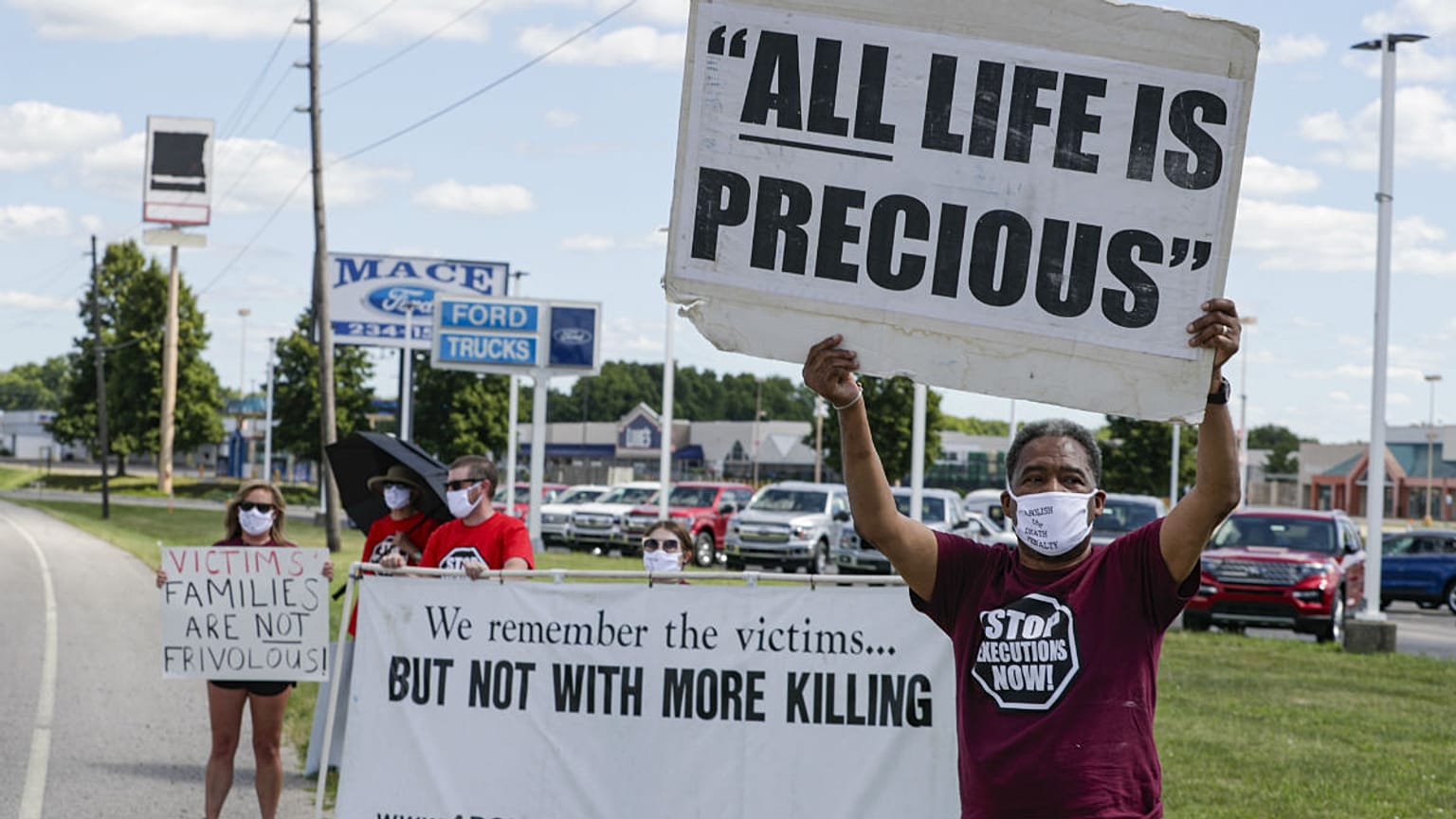 Protesters against the death penalty gather in Terre Haute, Ind., Monday, July 13, 2020