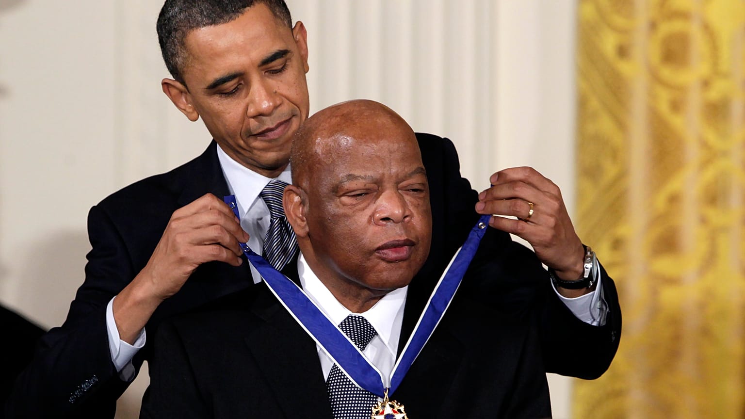 President Barack Obama presents a 2010 Presidential Medal of Freedom to U.S. Rep. John Lewis on Feb. 15, 2011.