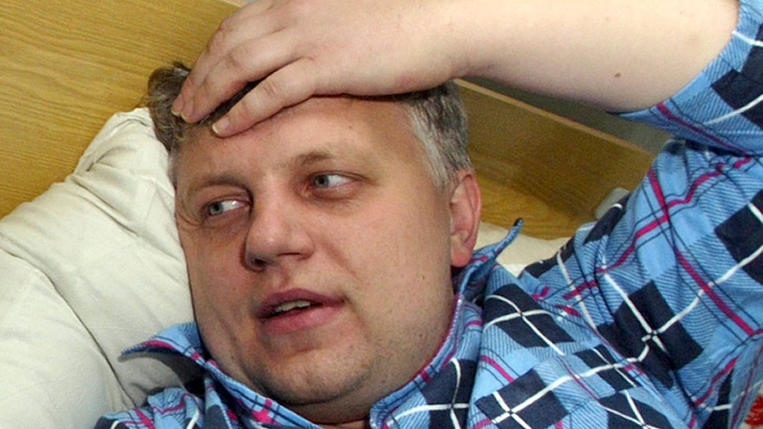 Journalist Pavel Sheremet at a hospital in Minsk, Belarus, after he was found badly beaten on Oct. 18, 2004