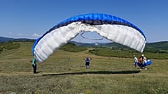Az első próbálkozások egyike a Hármashatárhegyi repülőtéren