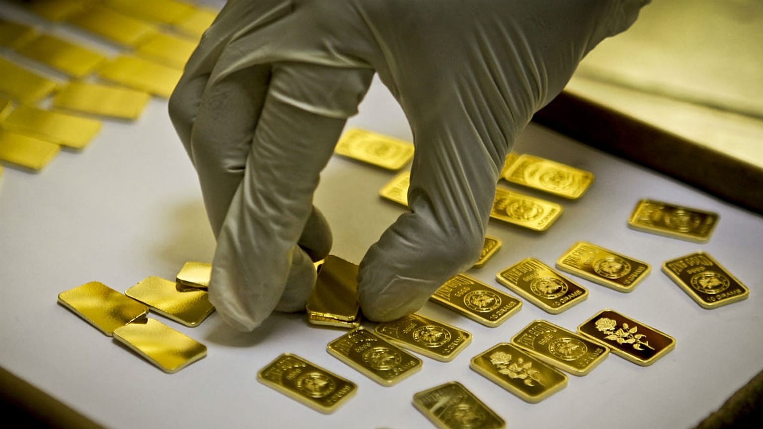  A gold press operator collects 10 gram gold blanks