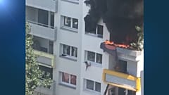 طفلان يقفزان من الطابق الثالث هربا من ألسنة اللهب
