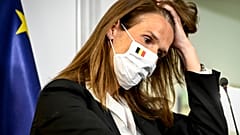 Belgian PM Sophie Wilmes gestures during a news conference after a meeting of the National Security Council to discuss lockdown measures in Brussels. July 23, 2020.