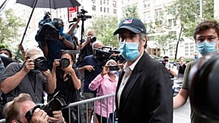 Michael Cohen, Donald Trump's former personal lawyer, returns to his apartment after being released from prison.