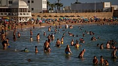 Bathers enjoy the beach in Cadiz, south of Spain, on Friday, July 24, 2020. 