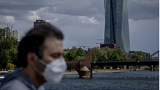  A man walks in front of the European Central Bank in Frankfurt, Germany