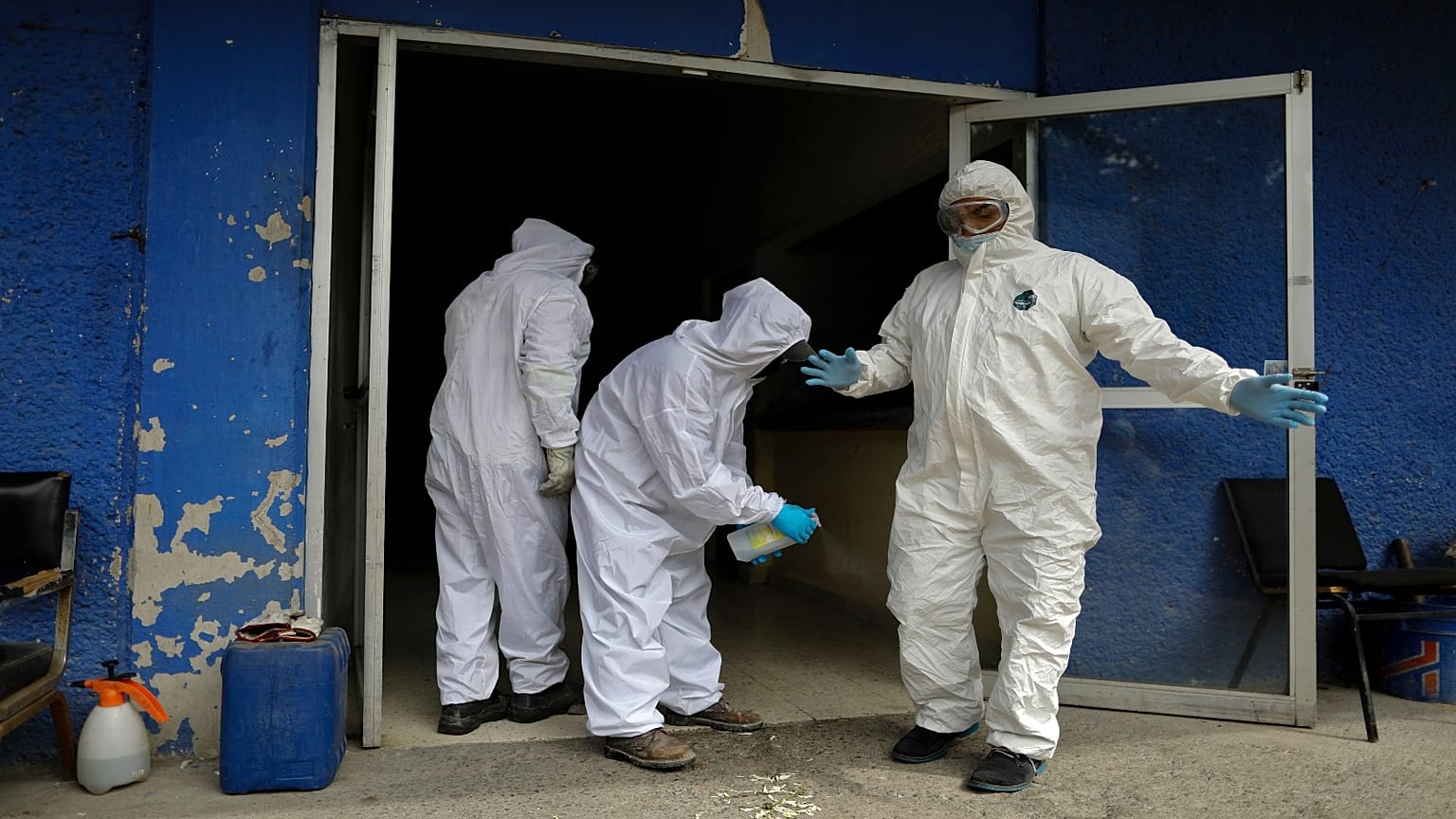 Workers at the crematorium at Xilotepec Cemetery in Xochimilco, Mexico City