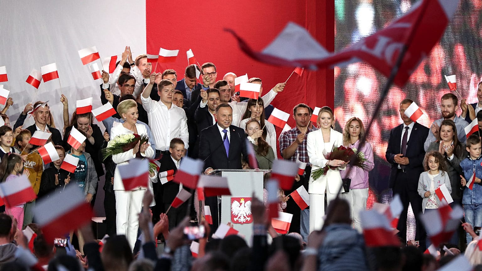 Incumbent President Andrzej Duda addresses supporters in Pultusk, Poland, Sunday, July 12, 2020.