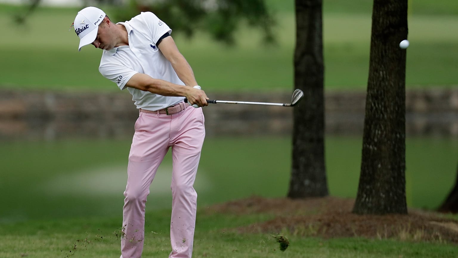 Justin Thomas hits form the fairway on the first hole during the final round of the World Golf Championship-FedEx St. Jude Invitational Sunday, Aug. 2, 2020