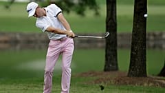 Justin Thomas hits form the fairway on the first hole during the final round of the World Golf Championship-FedEx St. Jude Invitational Sunday, Aug. 2, 2020