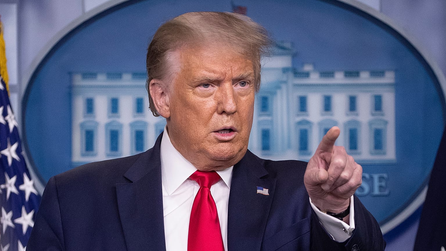 President Donald Trump points to a question as he speaks during a briefing with reporters in the James Brady Press Briefing Room of the White House, Monday, Aug. 3, 2020.