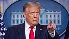President Donald Trump points to a question as he speaks during a briefing with reporters in the James Brady Press Briefing Room of the White House, Monday, Aug. 3, 2020.
