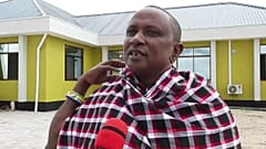 Saniniu Laizer speaks to the media after handing over two of the biggest rough tanzanite gemstones ever found to government officials, at a ceremony in Mererani, Tanzania 