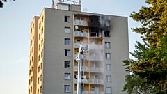 Firefighters battle a fire in an apartment building in Bohumin, northeastern Czech Republic, on Saturday, Aug. 8, 2020. 