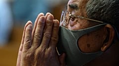 A man attends mass held in memory of bomb victims at Urakami Church to mark the 75th anniversary of the atomic bombing of Nagasaki, in the city on August 9, 2020.