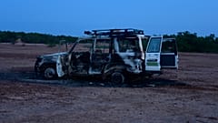 Ausgebranntes Autowrack der Opfer