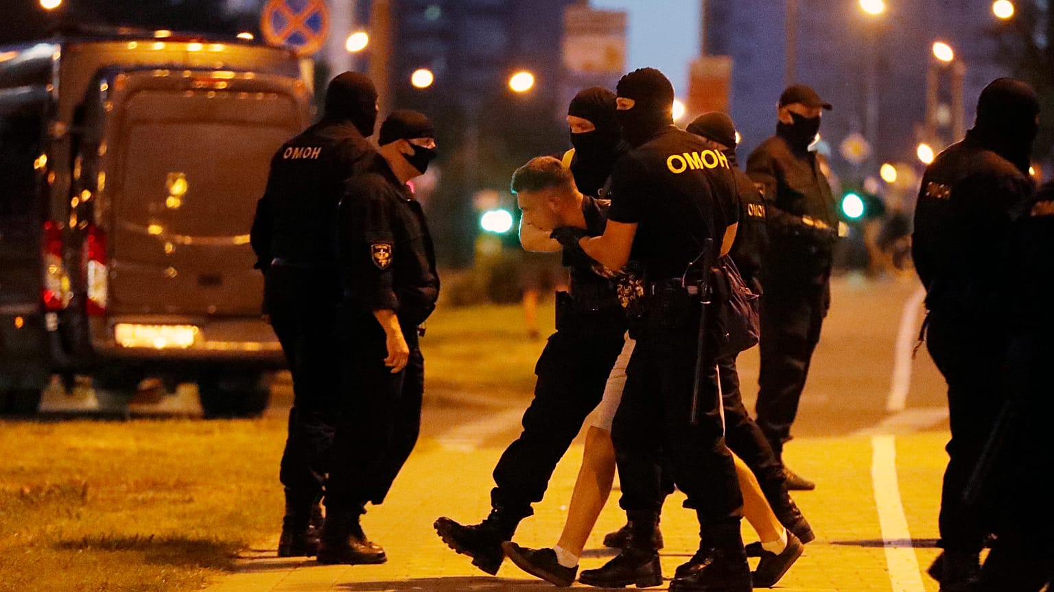 A police officer detain a protester during a rally after the Belarusian presidential election in Minsk, Belarus. Aug. 9, 2020. 