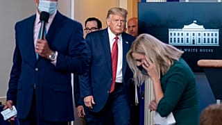 Donald Trump left the briefing for a short while, before returning and asking: "Do I seem rattled?"