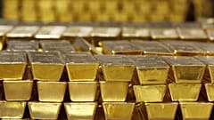 Gold bars are stacked in a vault at the United States Mint, in West Point, N.Y