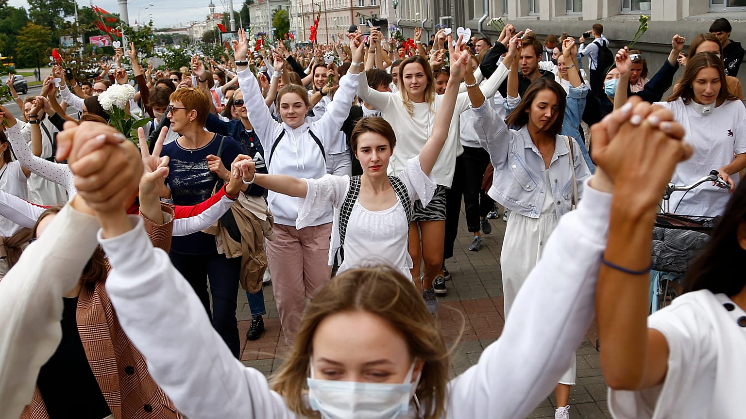 About 200 women march in solidarity with protesters injured in the latest rallies against the results of the presidential election in Minsk, Wednesday, August 12, 2020..