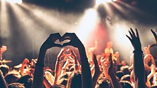 A crowd attends a music concert before the coronavirus pandemic hit Europe
