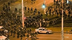 Police move to block demonstrators during a mass rally following the presidential election in Minsk, Belarus,
