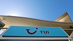 The sign above a branch of a Tui store in London, Thursday, July 30, 2020.
