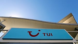 The sign above a branch of a Tui store in London, Thursday, July 30, 2020.