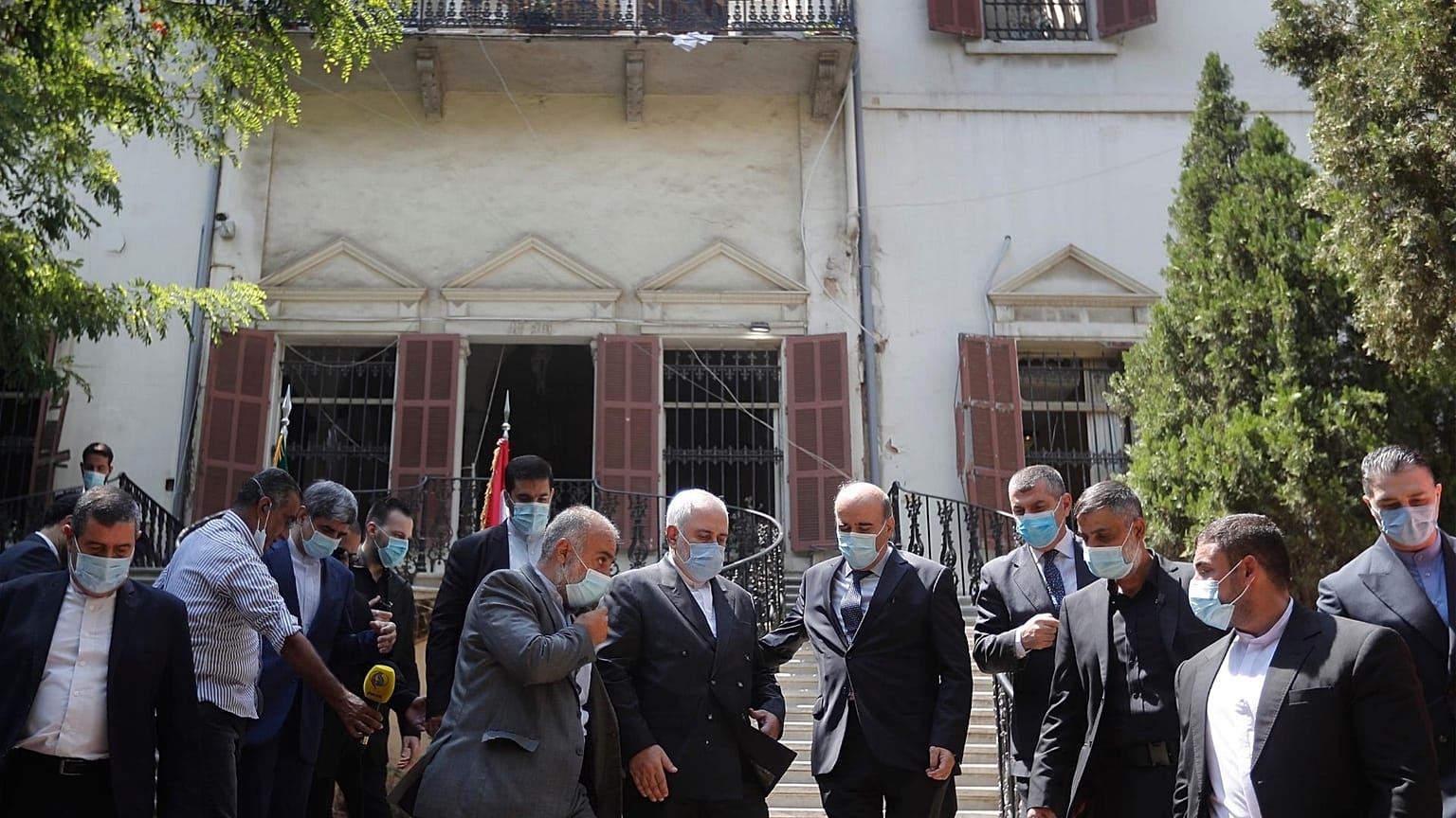 Iranian FM Zarif outside the Lebanese FM which damaged by last week's explosion