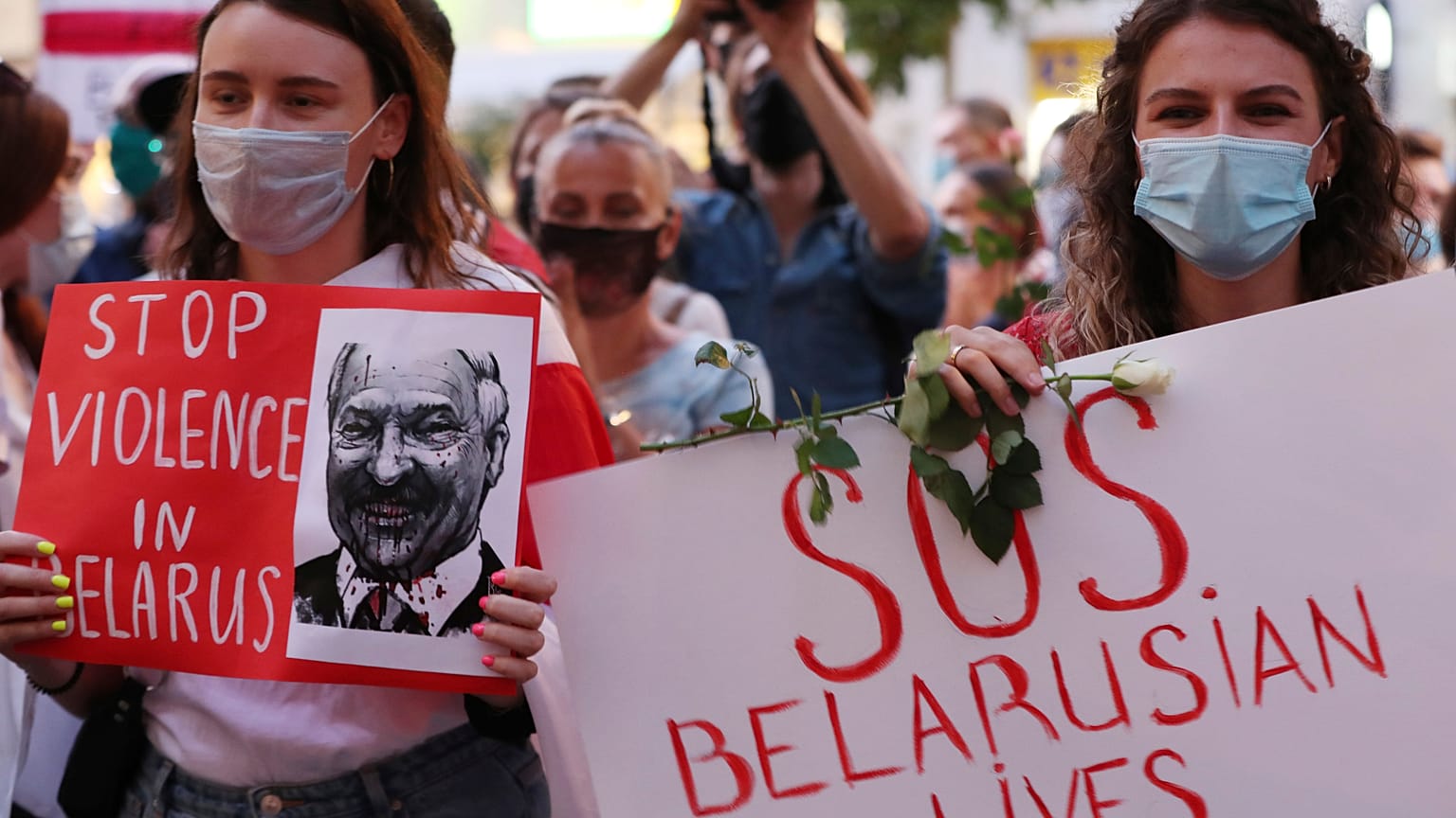People demonstrate in support of Belarusians after a troubled weekend presidential vote, in Warsaw, Poland, Thursday, Aug. 13, 2020